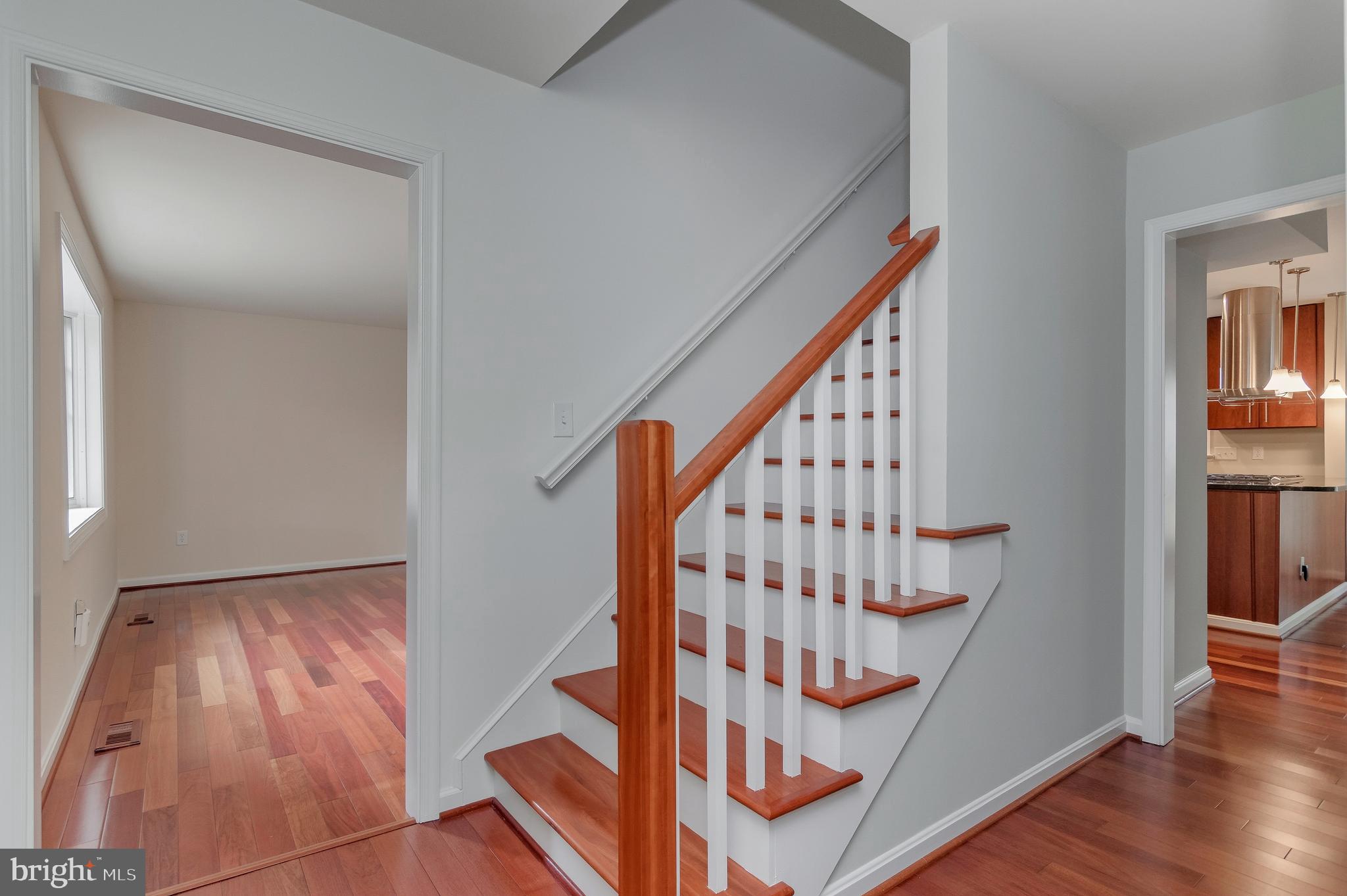 4043 20th Road North Arlington, VA 22207 - Photo 5 of 56 a view of staircase with wooden floor and stairs