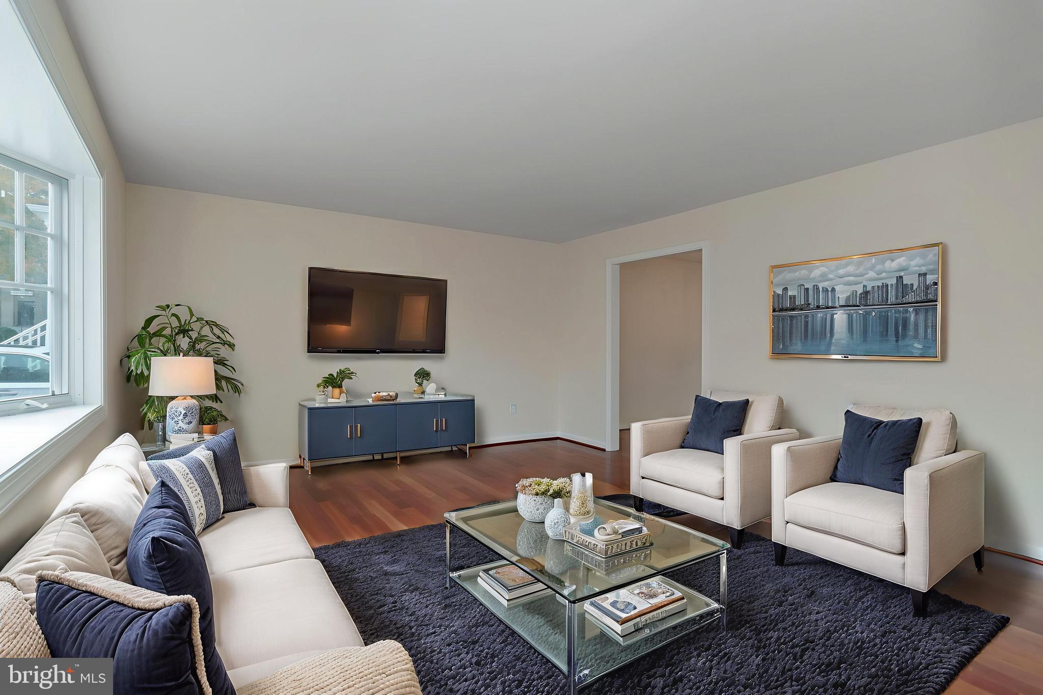 4043 20th Road North Arlington, VA 22207 - Photo 10 of 56 a living room with furniture and a flat screen tv