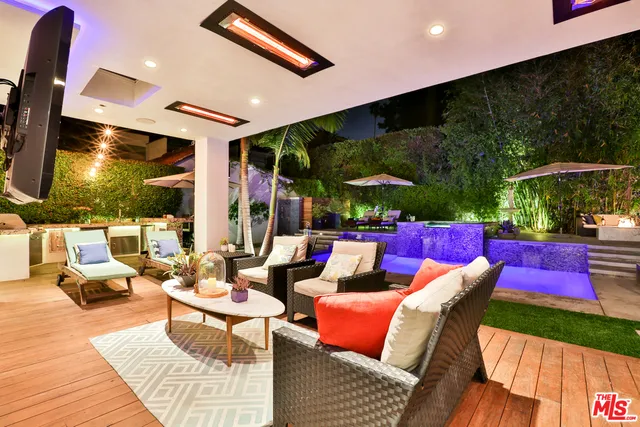 a outdoor space with lots of tables and chairs