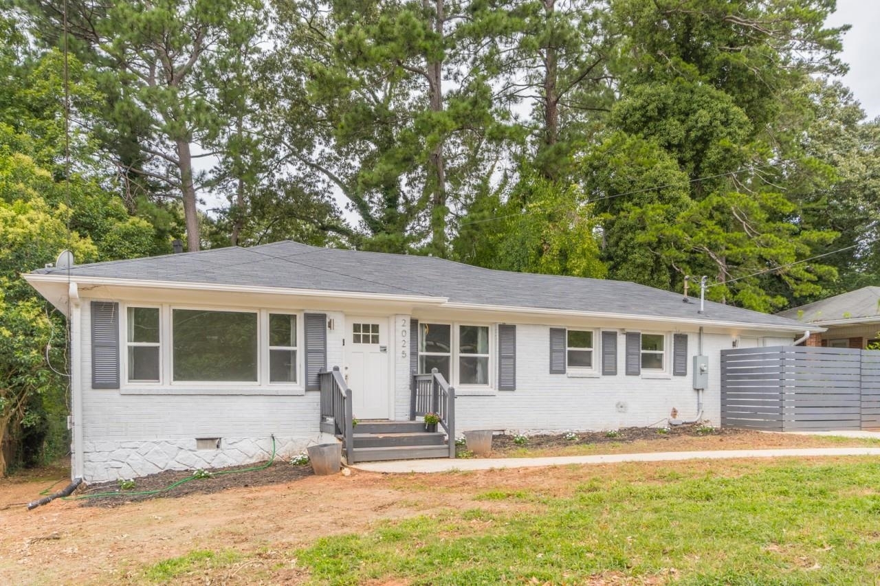 2025 Connie Lane Decatur, GA 30032 - Photo 1 of 1 a house with trees in the background