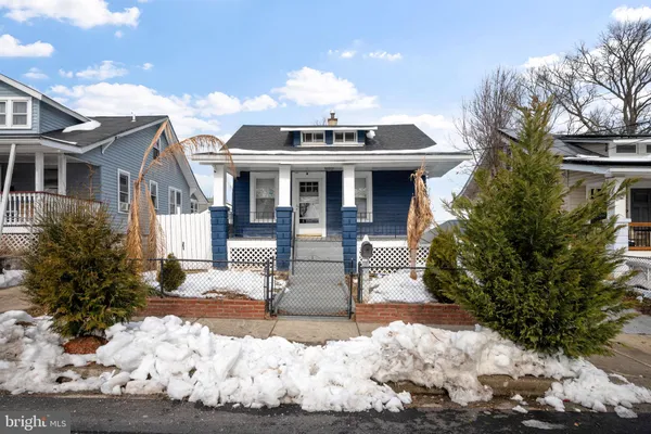a view of livingroom with hardwood floor and a ceiling fan