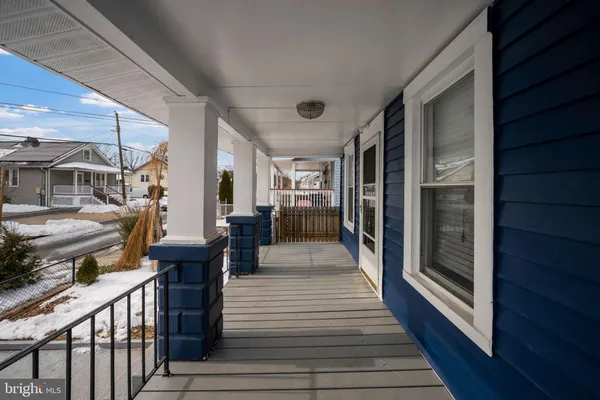 a view of a hallway with front door