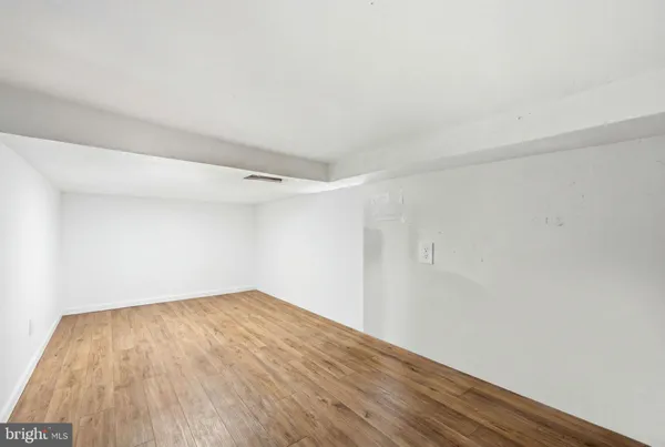 an aerial view of a backyard with seating space