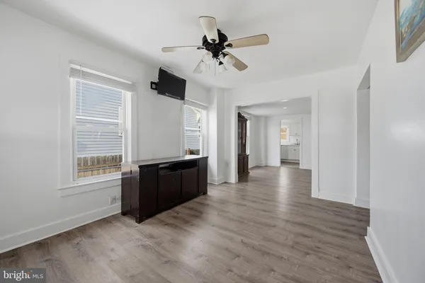 a kitchen with cabinets appliances and a sink