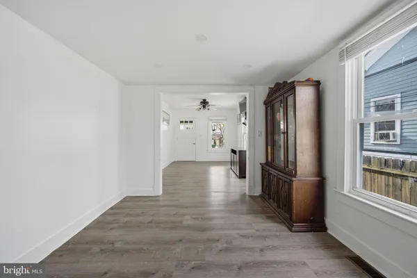 a kitchen with cabinets appliances and a sink