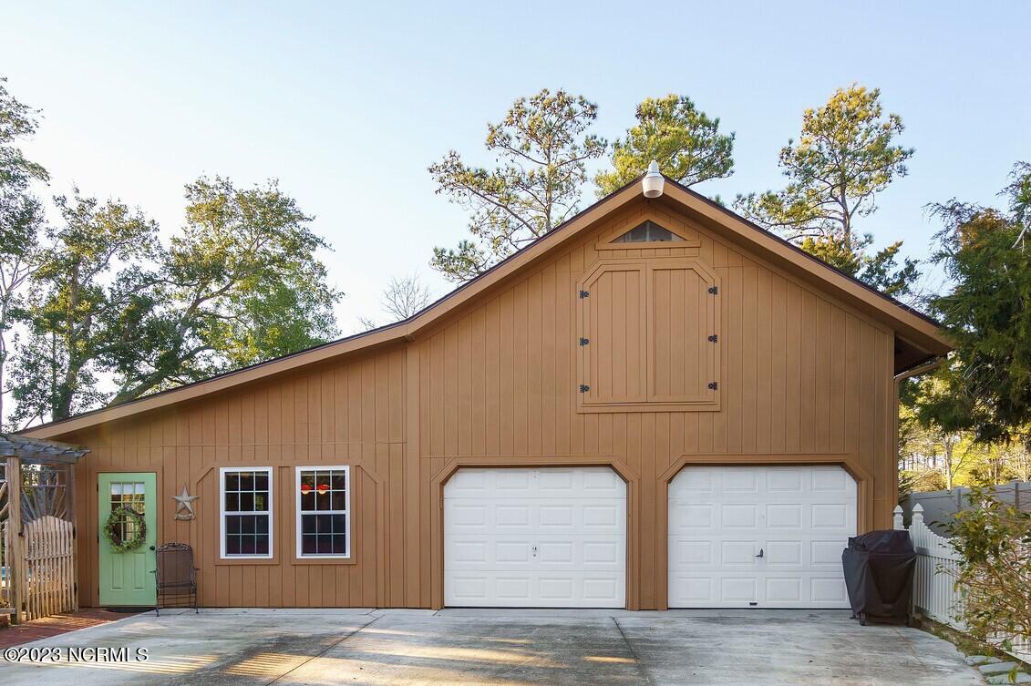 105 Inlet Court Hampstead, NC 28443 - Photo 64 of 95 2-car garage and Pool House