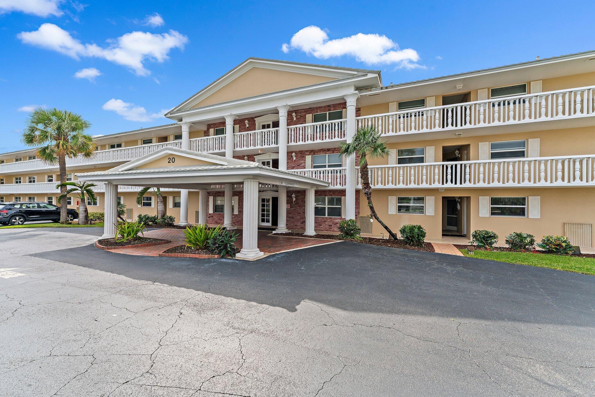 20 Celestial Way, Unit 215 Juno Beach, FL 33408 - Photo 23 of 25 a front view of a building with street