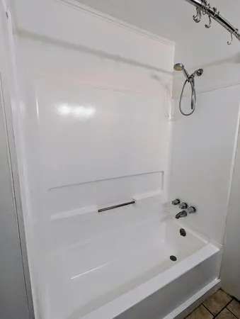 a bathroom with a bathtub