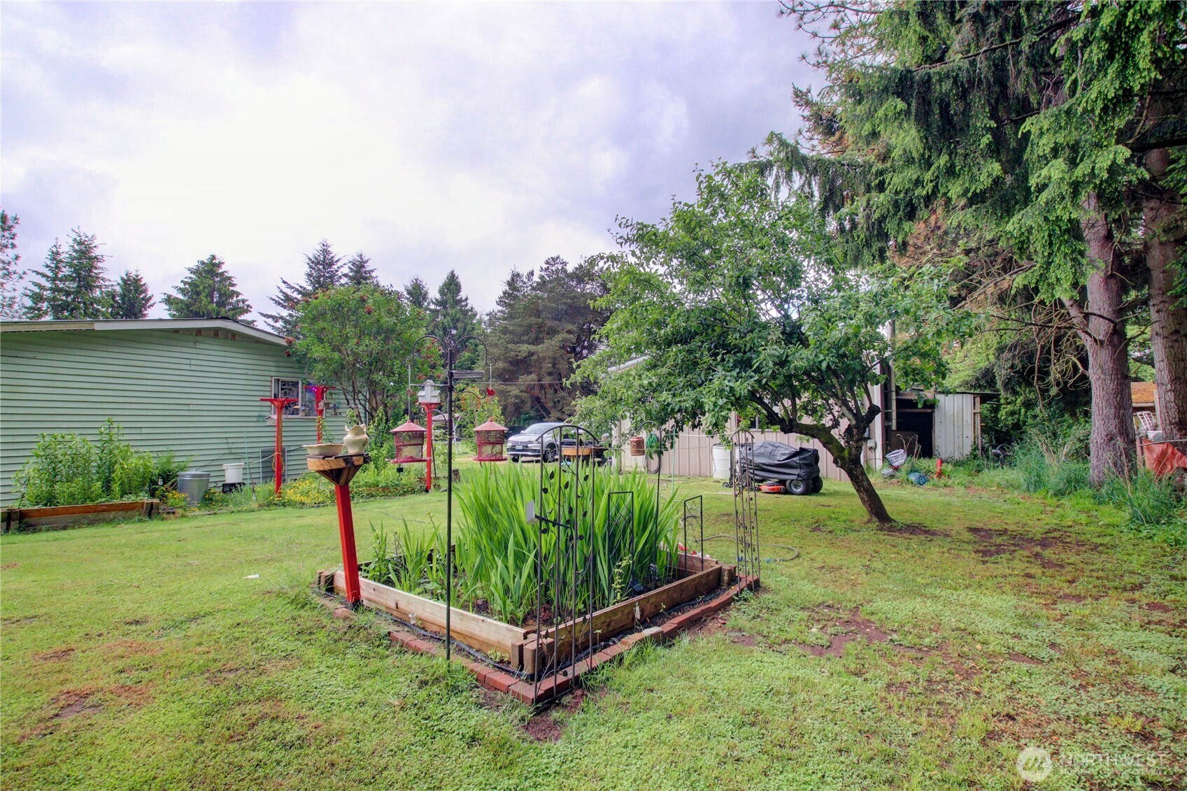 7185 Old Highway 99 North Road Burlington, WA 98233 - Photo 18 of 26 a view of a backyard with swimming pool