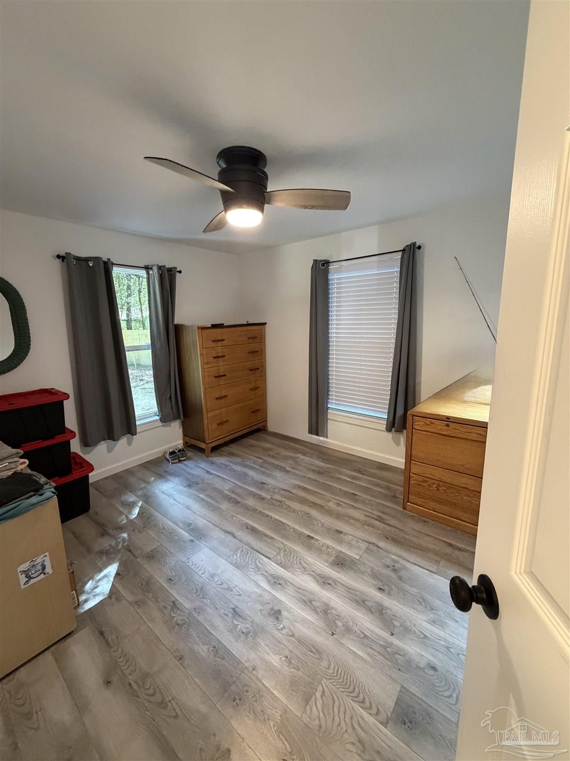 4532 Limit Street Milton, FL 32583 - Photo 13 of 18 a view of an empty room and window