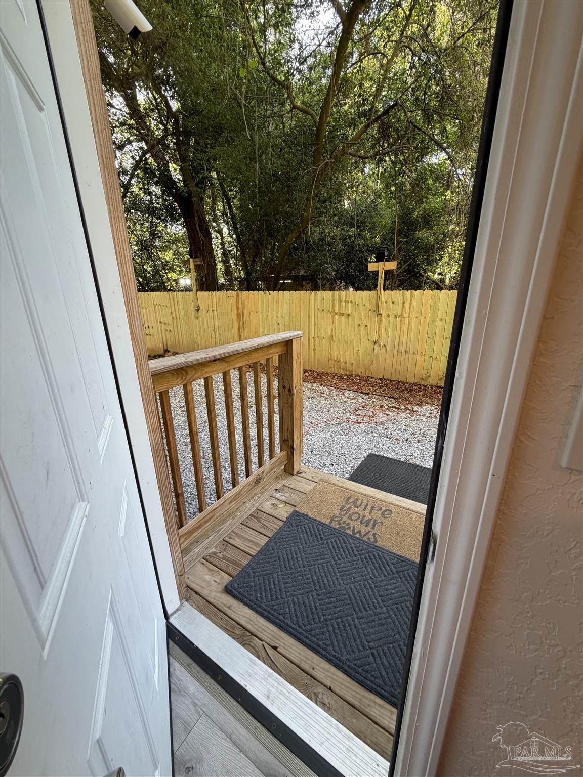 4532 Limit Street Milton, FL 32583 - Photo 6 of 18 a view of a porch