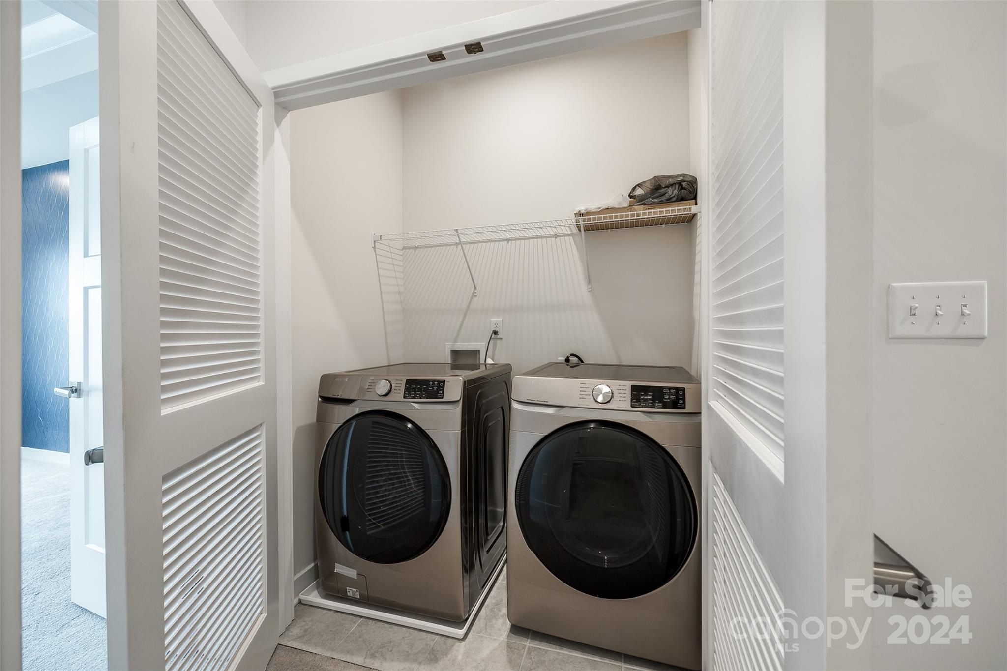 664 Crudent Road Tega Cay, SC 29708 - Photo 28 of 34 a utility room with dryer and washer