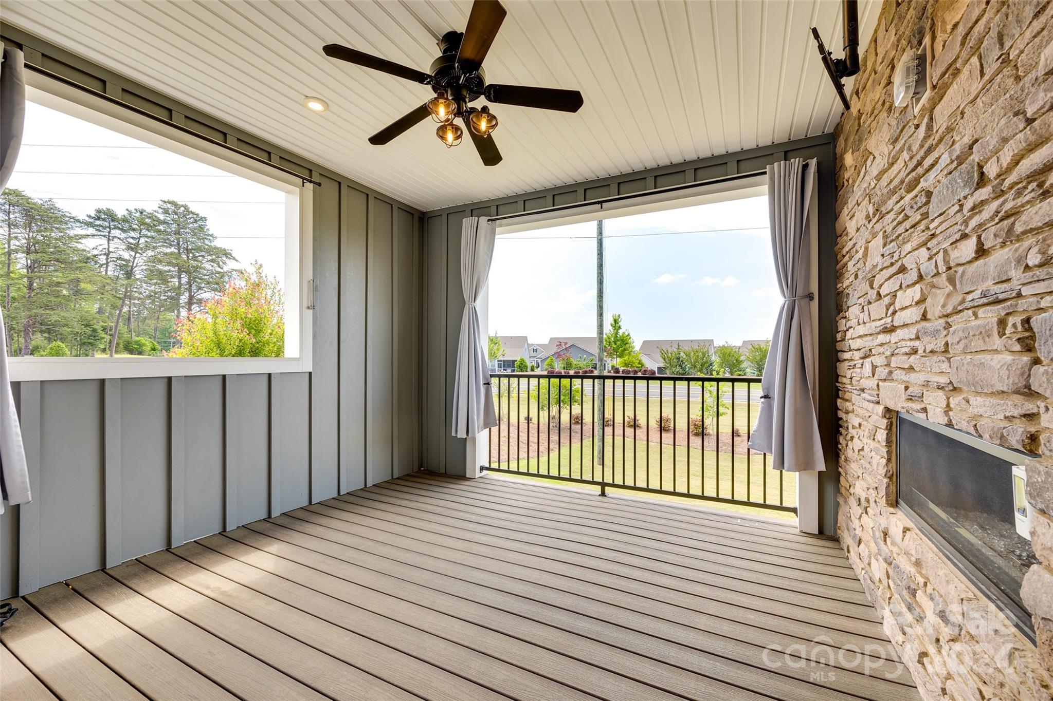 664 Crudent Road Tega Cay, SC 29708 - Photo 29 of 34 a view of a balcony with wooden floor