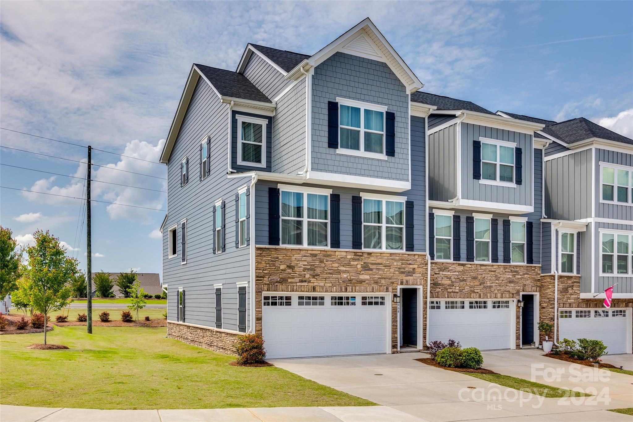 664 Crudent Road Tega Cay, SC 29708 - Photo 33 of 34 a front view of a house with a yard
