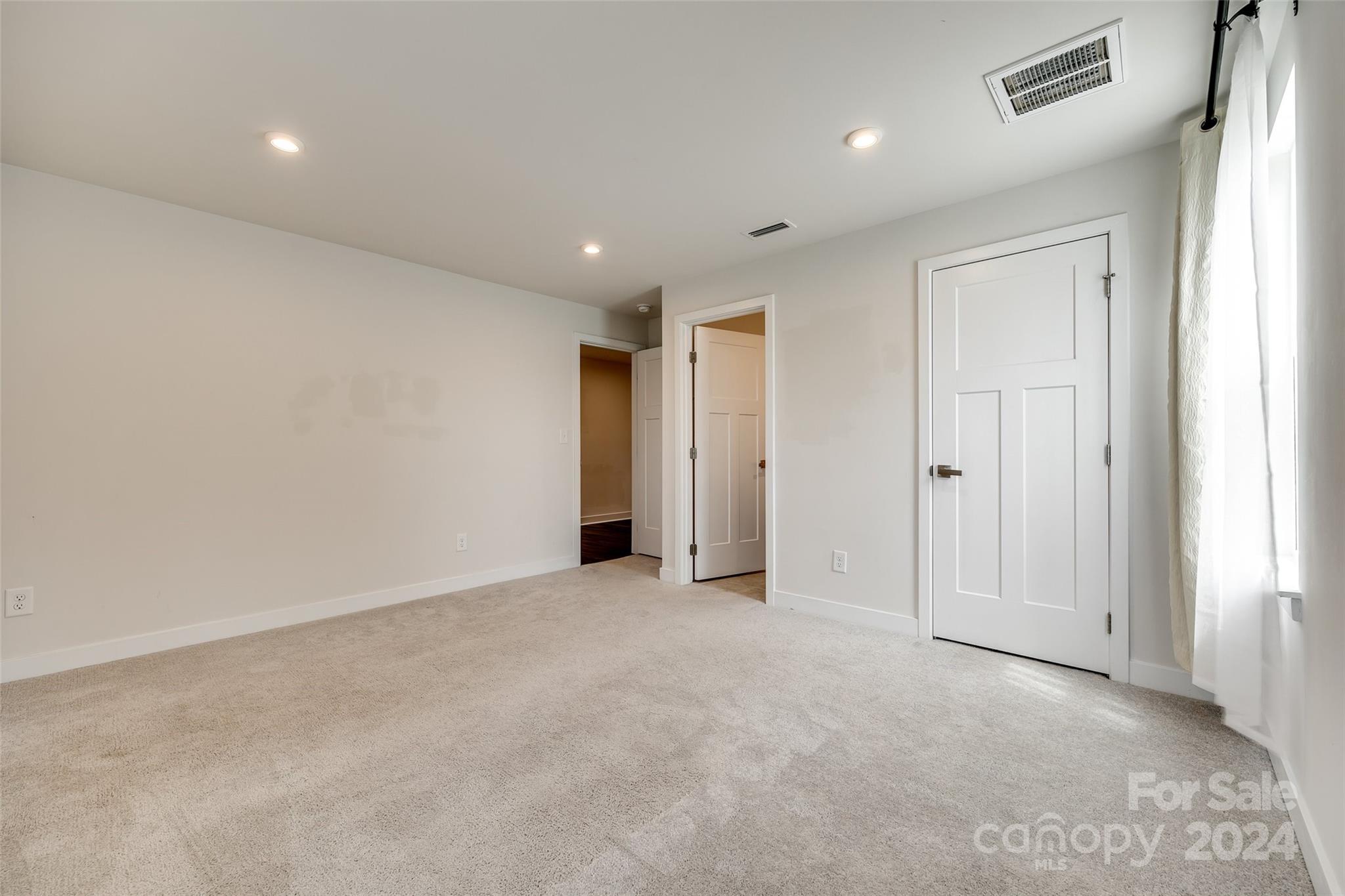 664 Crudent Road Tega Cay, SC 29708 - Photo 5 of 34 an empty room with closet area