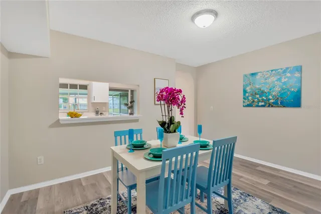 a view of a dining room with furniture