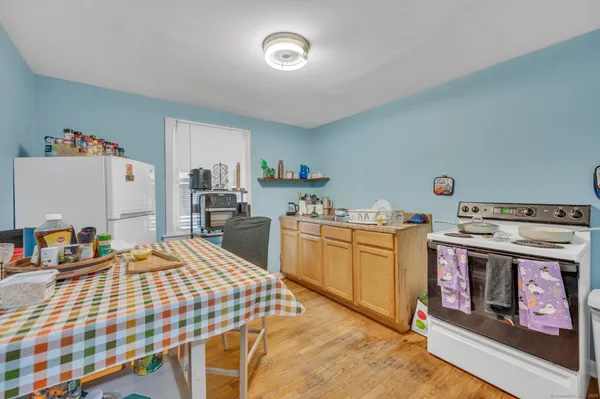 a room with a table and chairs