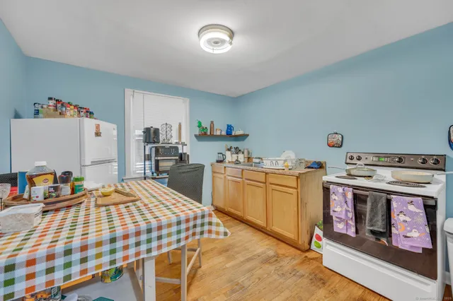 a room with a table and chairs