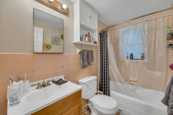 an aerial view of a house with a big yard