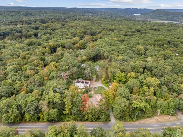 a view of a field with an outdoor space
