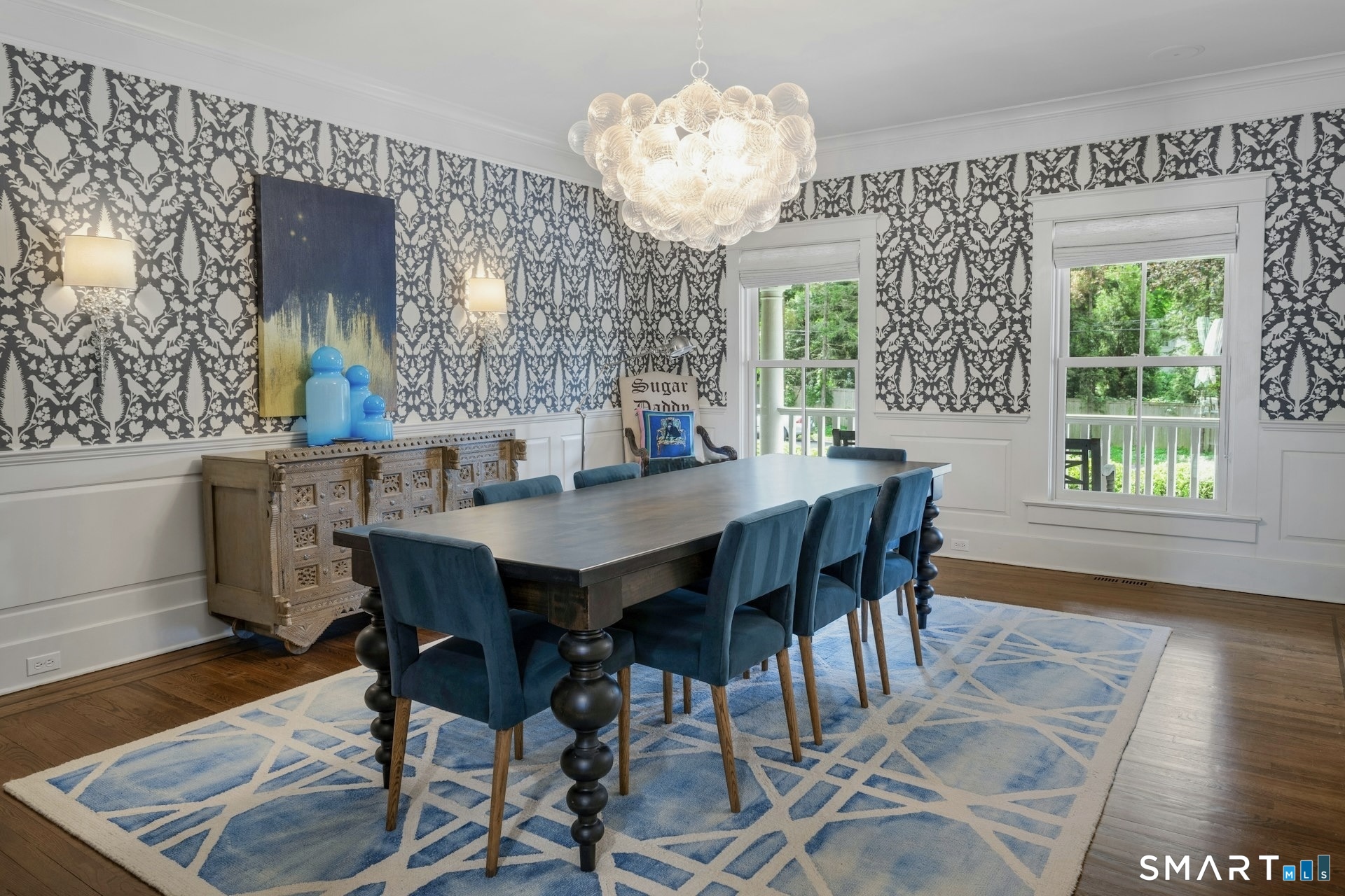 2 Roland Drive Darien, CT 06820 - Photo 8 of 40 a view of a dining room with furniture window and wooden floor