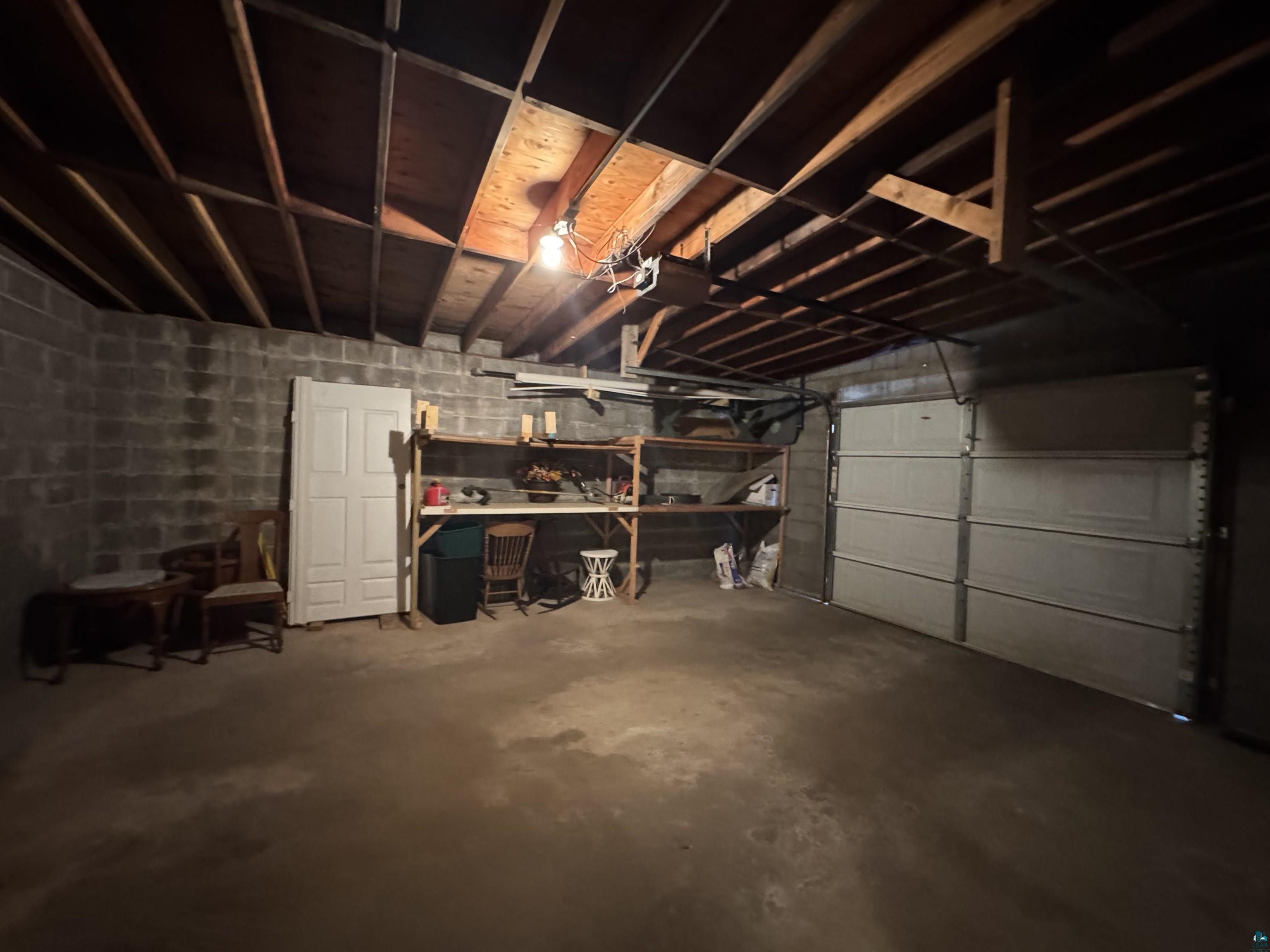 406 4th Street Moose Lake, MN 55767 - Photo 22 of 42 One Car Garage with Storage Racks