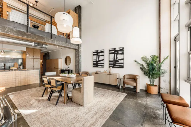 a view of a living room with a large window