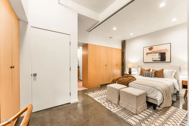 a bathroom with a shower and a sink