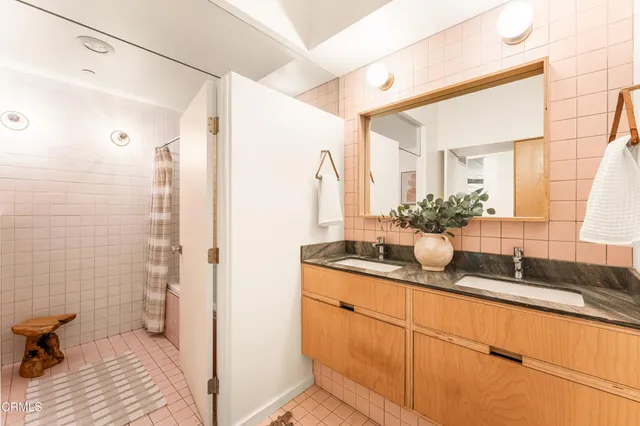 a view of a chairs and table in patio