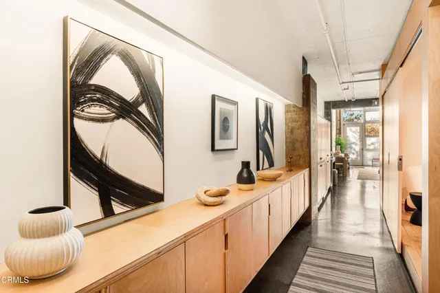 a bedroom with a bed and a view of bathroom