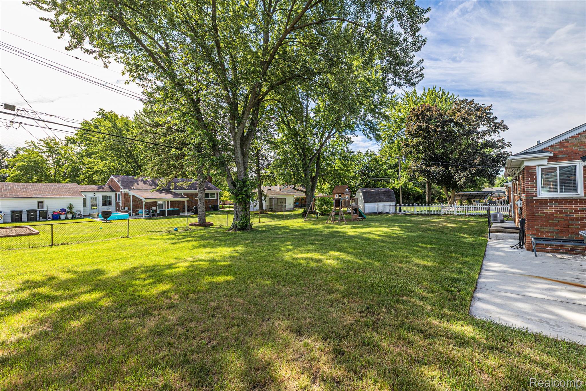 19044 Norwich Road Livonia, MI 48152 - Photo 2 of 27 Larged Fenced Backyard