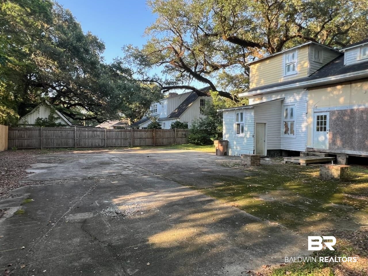 104 Mohawk Street Mobile, AL 36606 - Photo 10 of 12 Rear view of property with entry steps