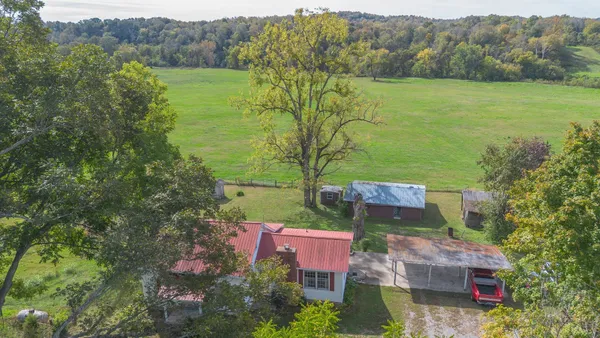 an aerial view of a house with a garden