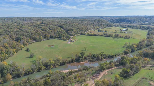 an aerial view of a houses with outdoor space