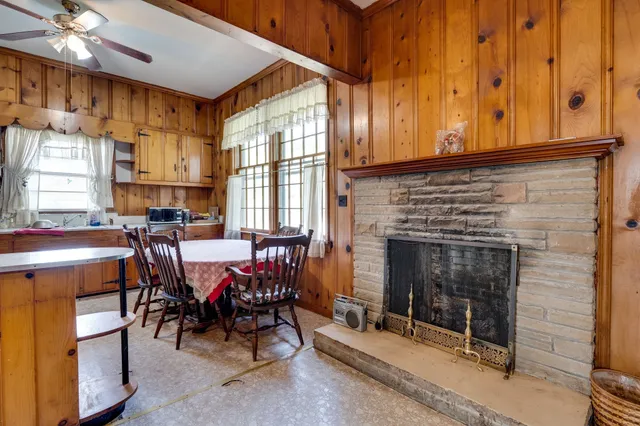 a view of a livingroom with furniture and window