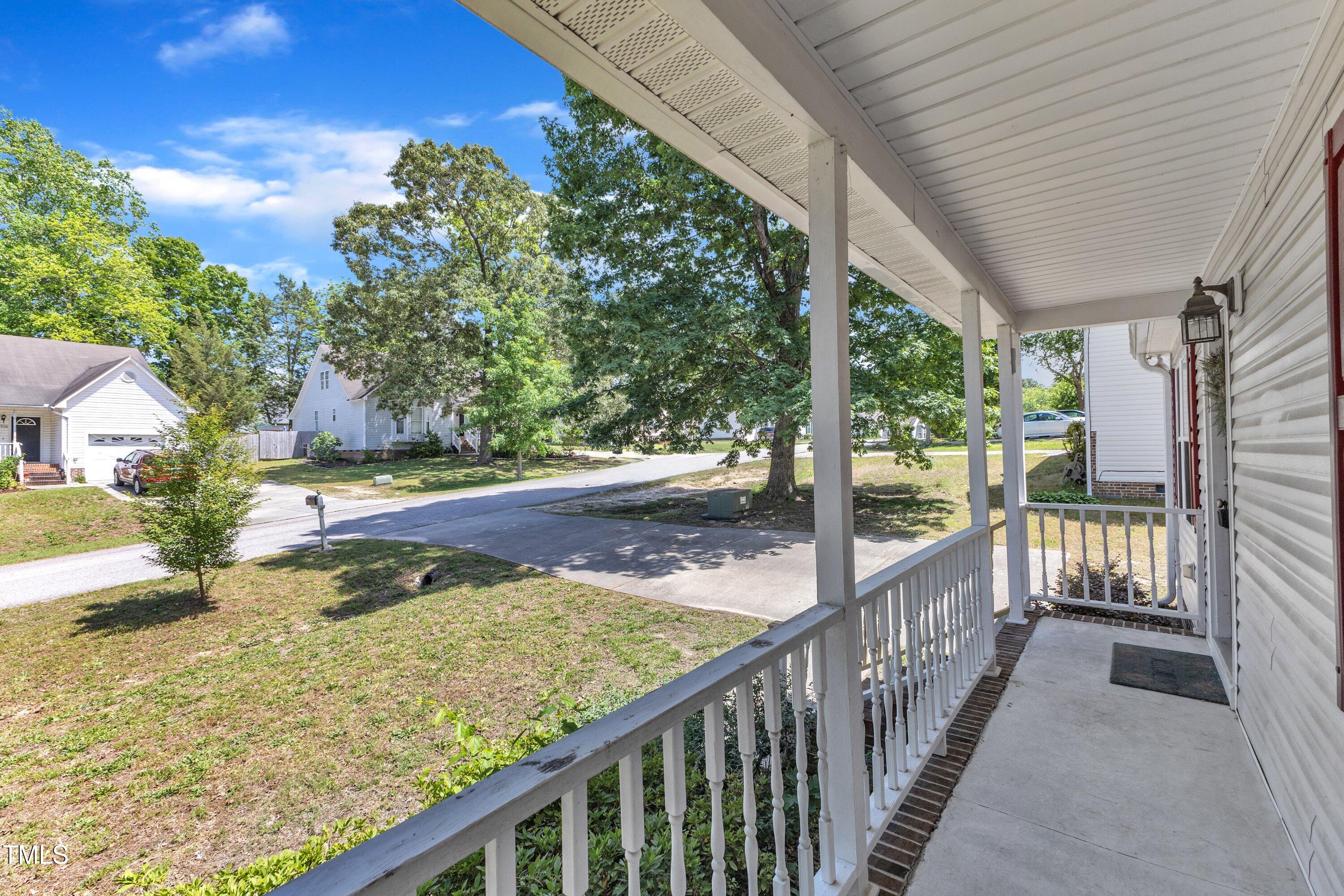 4533 Whistling Way Raleigh, NC 27616 - Photo 3 of 25 Covered Front Porch with concrete floor