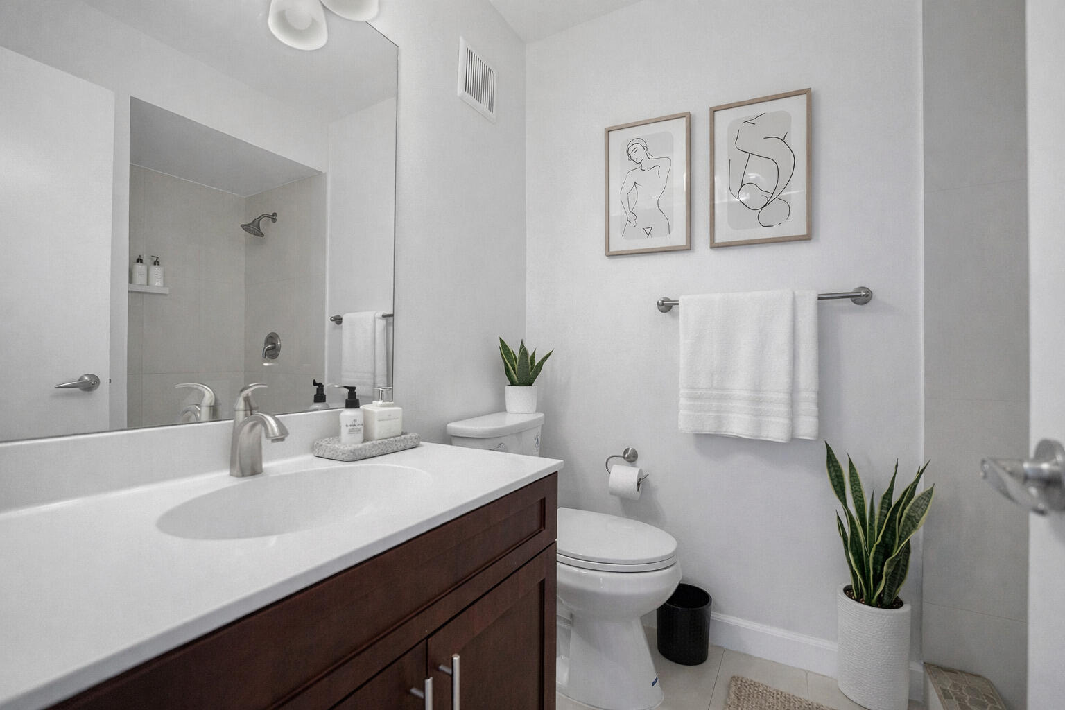 4550 Southwest 68th Ct Circle, Unit 548 Miami, FL 33155 - Photo 13 of 51 a bathroom with a sink a toilet a mirror and vanity