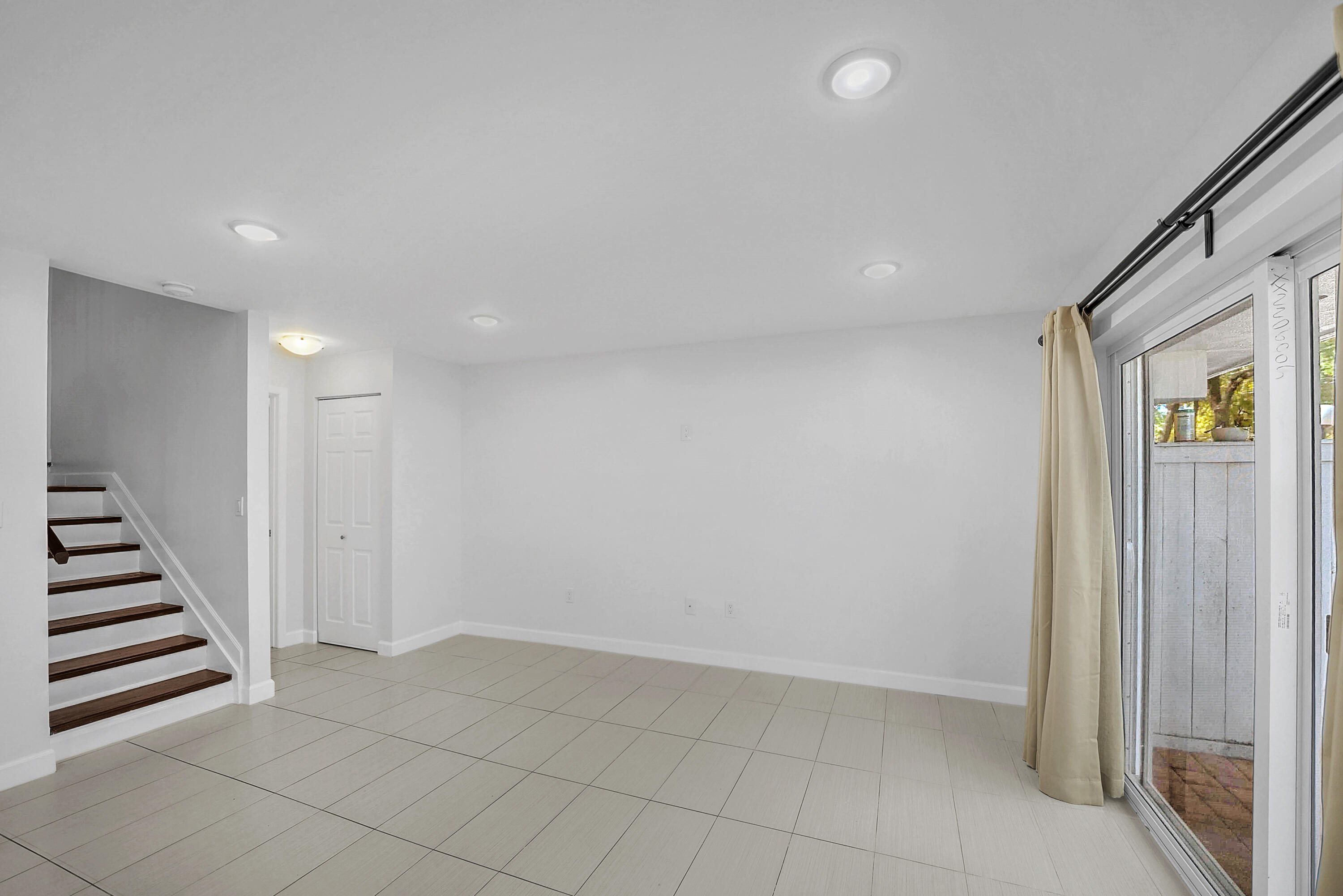 4550 Southwest 68th Ct Circle, Unit 548 Miami, FL 33155 - Photo 42 of 51 a view of an entryway with stairs