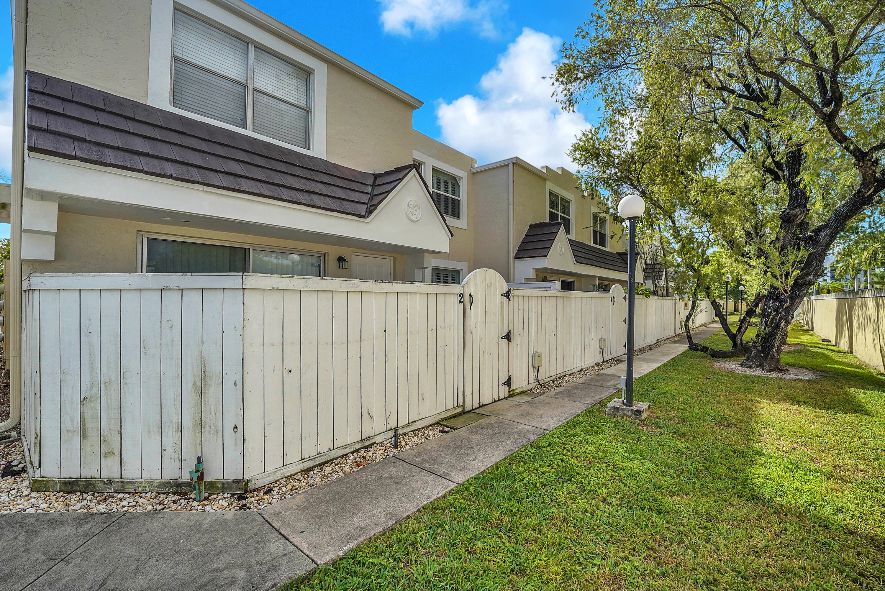4550 Southwest 68th Ct Circle, Unit 548 Miami, FL 33155 - Photo 47 of 51 a view of a backyard