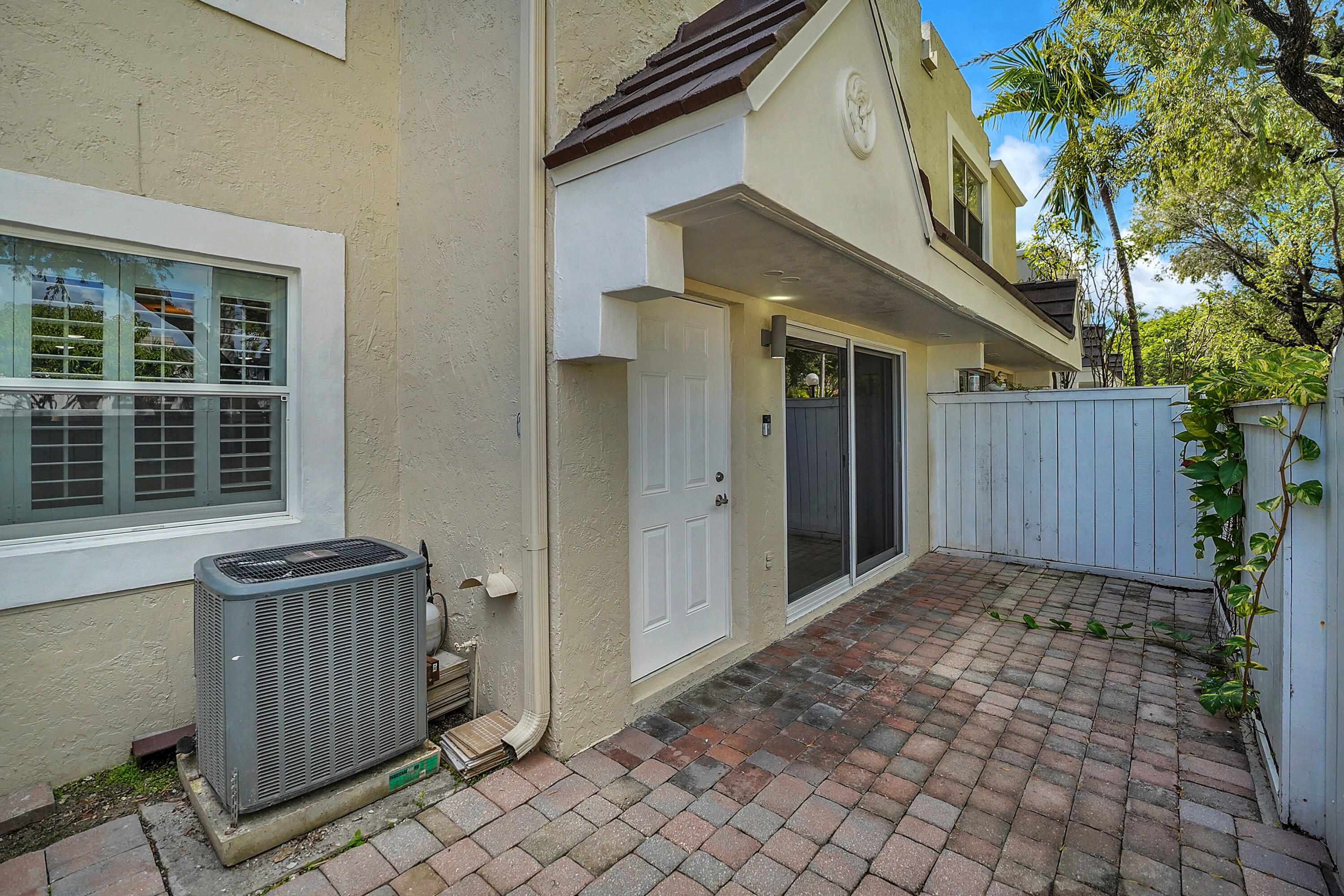 4550 Southwest 68th Ct Circle, Unit 548 Miami, FL 33155 - Photo 51 of 51 a view of a house with a wooden fence