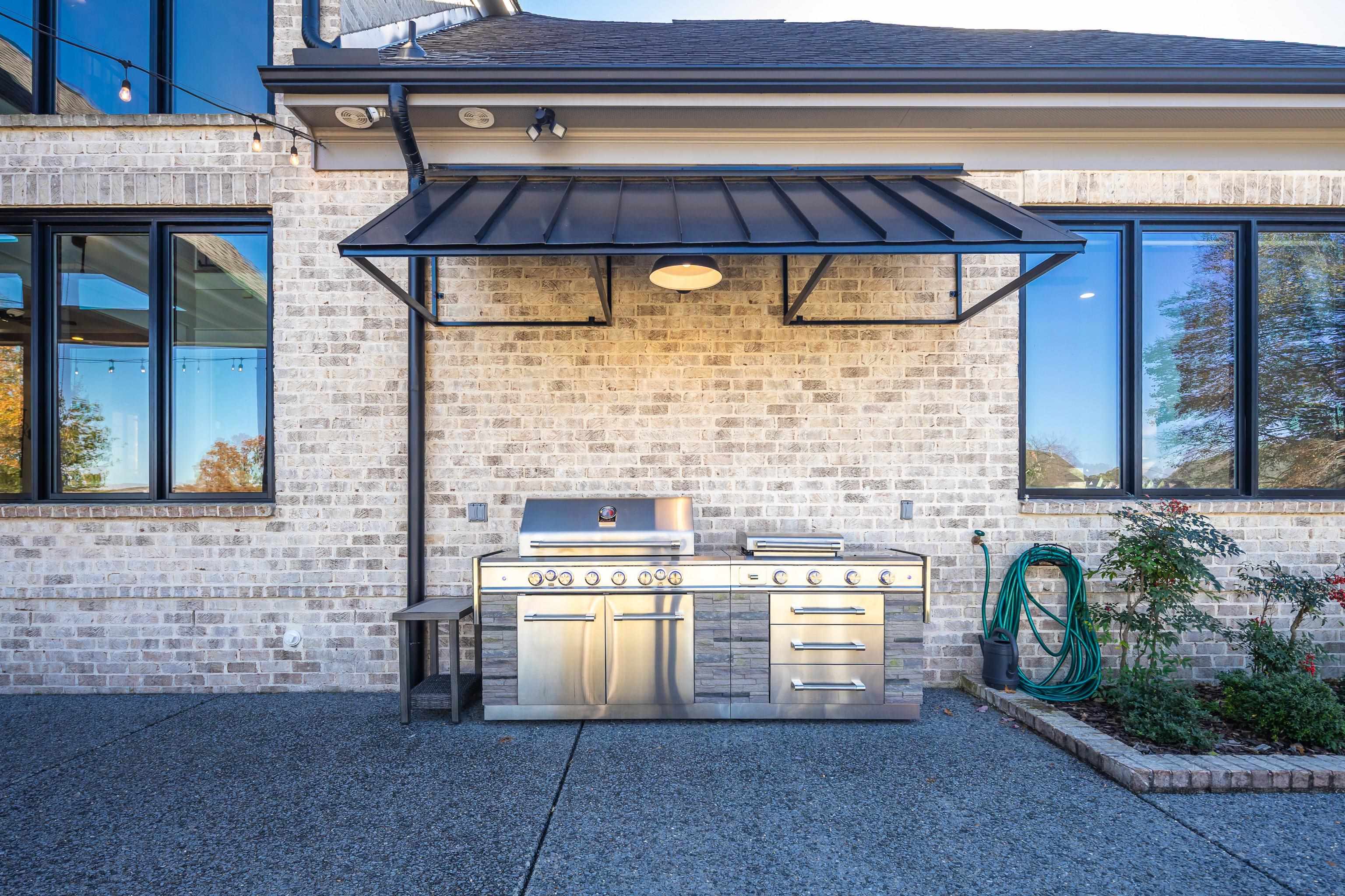 170 Twin Lakes Road Piperton, TN 38017 - Photo 19 of 40 View of patio with an outdoor kitchen
