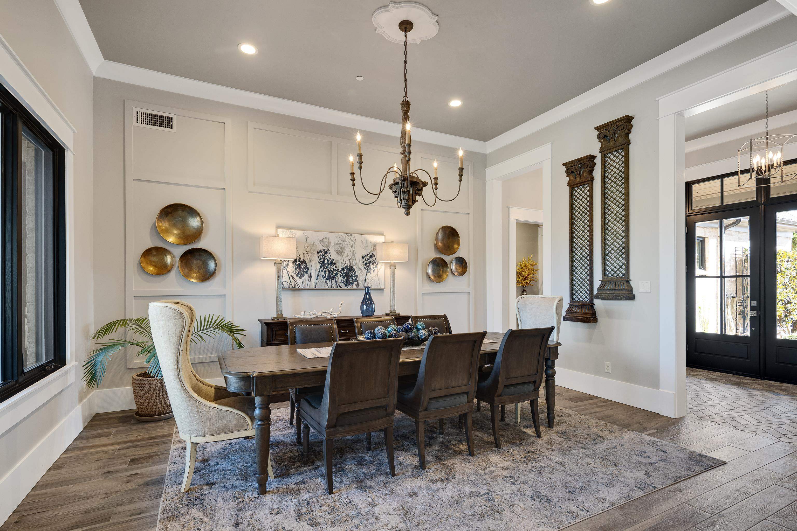 170 Twin Lakes Road Piperton, TN 38017 - Photo 3 of 40 Dining room with a chandelier, wood finished floors, ornamental molding, french doors, and recessed lighting