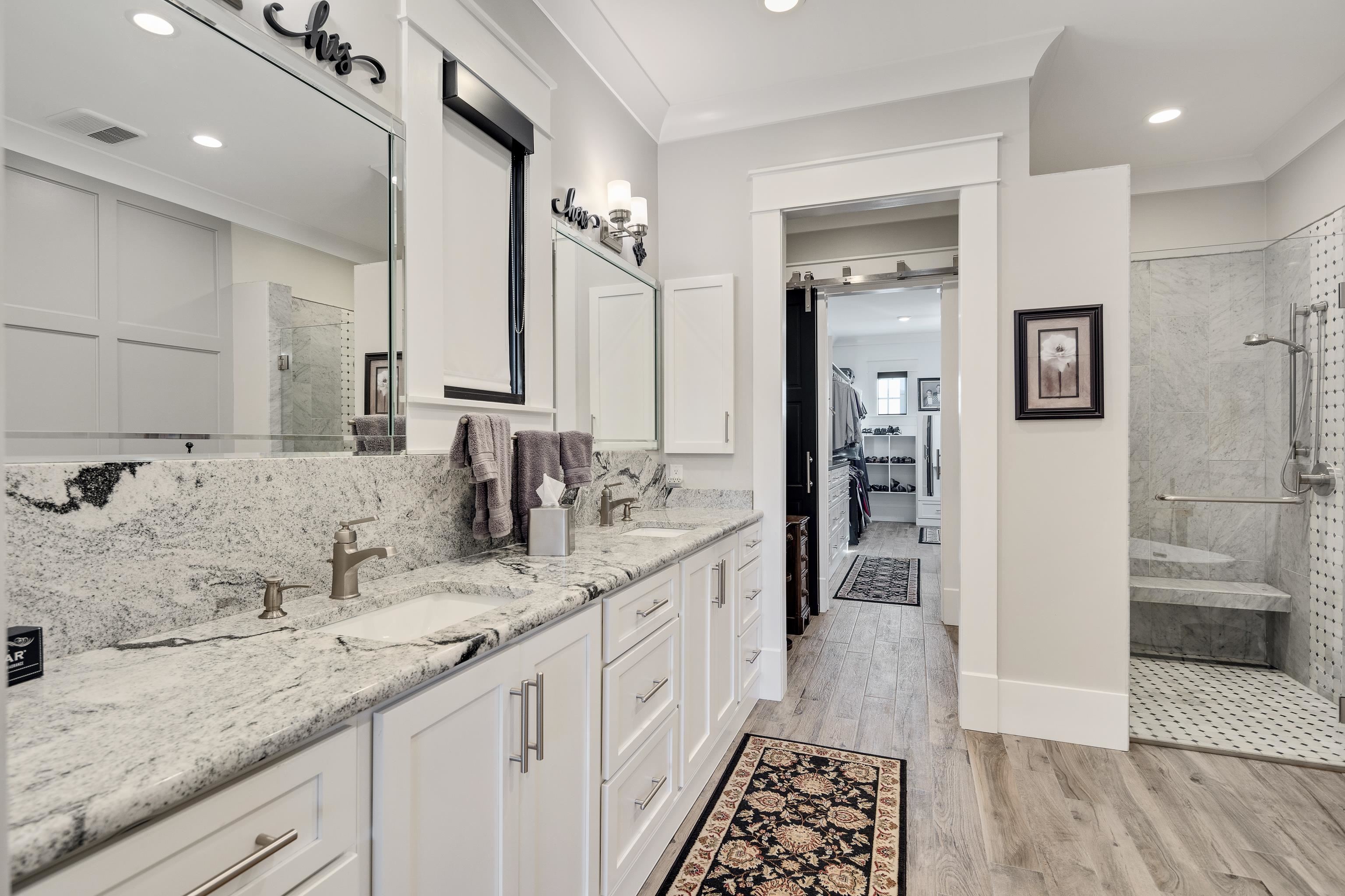 170 Twin Lakes Road Piperton, TN 38017 - Photo 8 of 40 Bathroom featuring double vanity, a marble finish shower, a walk in closet, light wood finished floors, and recessed lighting