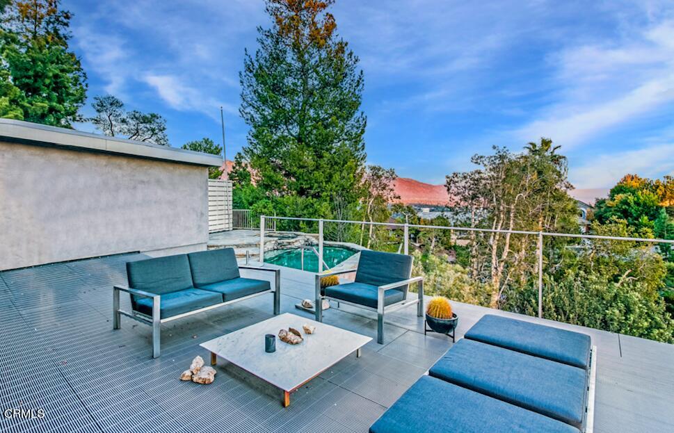1290 Fairlawn Way Pasadena, CA 91105 - Photo 22 of 30 a roof deck with couches and potted plants
