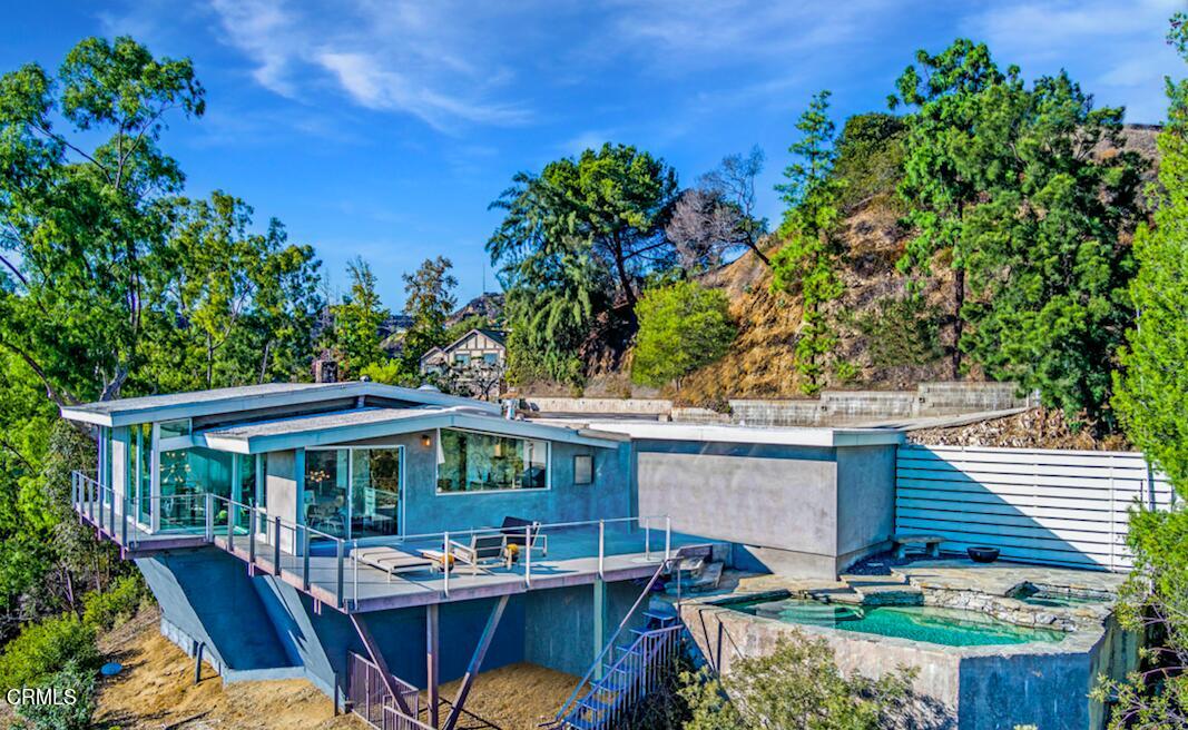 1290 Fairlawn Way Pasadena, CA 91105 - Photo 3 of 30 a view of house with a patio and a garden