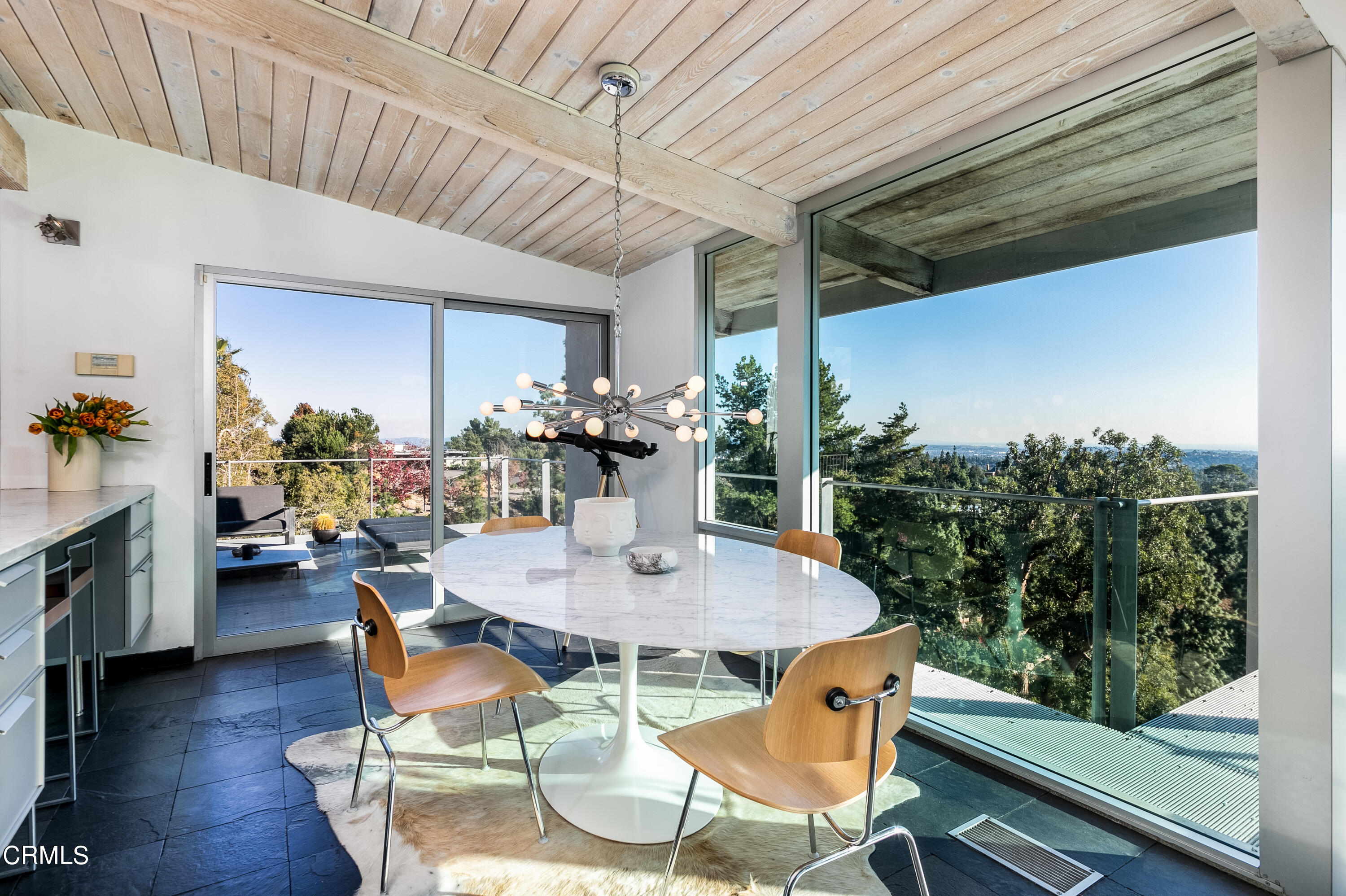1290 Fairlawn Way Pasadena, CA 91105 - Photo 10 of 30 a outdoor dining table with chairs and potted plants