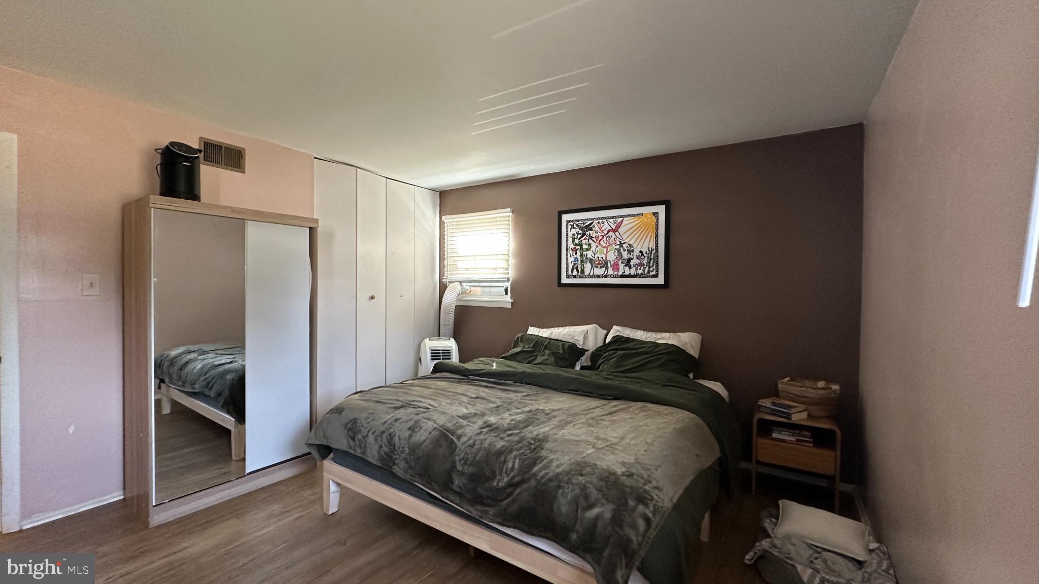 228 Embleton Road Owings Mills, MD 21117 - Photo 12 of 31 Cozy bedroom with warm, inviting tones.