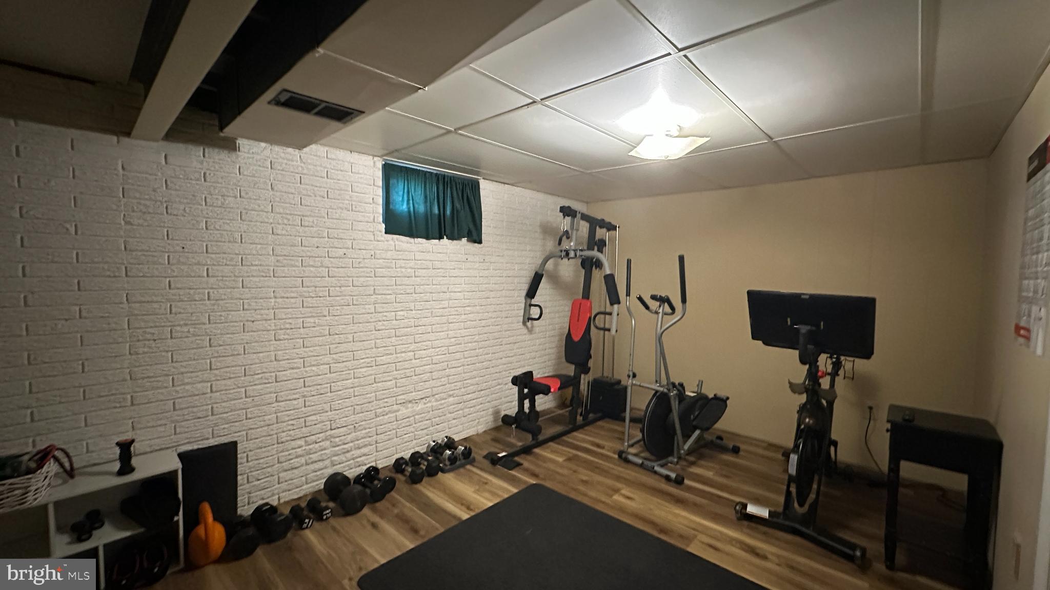 228 Embleton Road Owings Mills, MD 21117 - Photo 20 of 31 Home gym with modern fitness equipment.