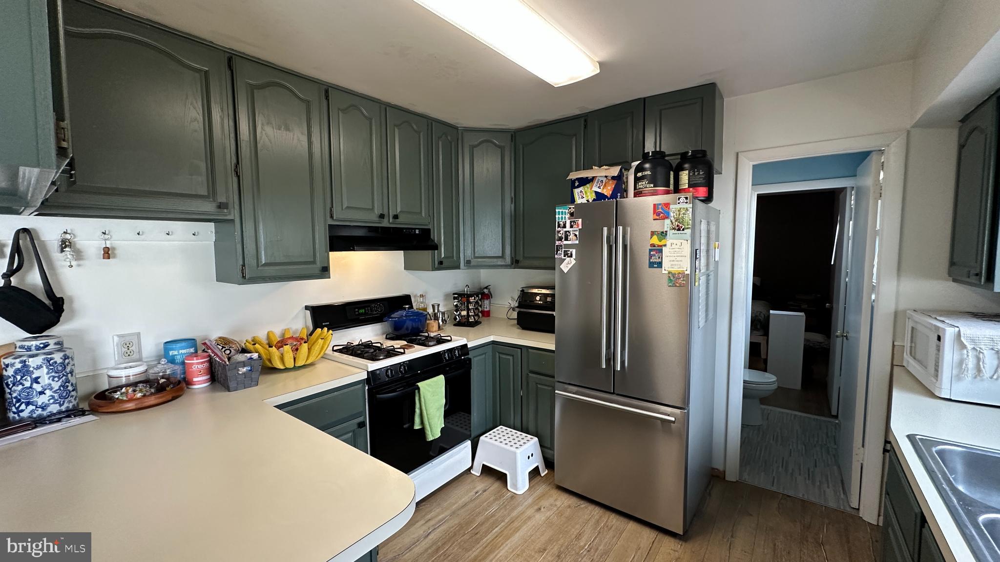 228 Embleton Road Owings Mills, MD 21117 - Photo 2 of 31 Charming kitchen with modern touches.