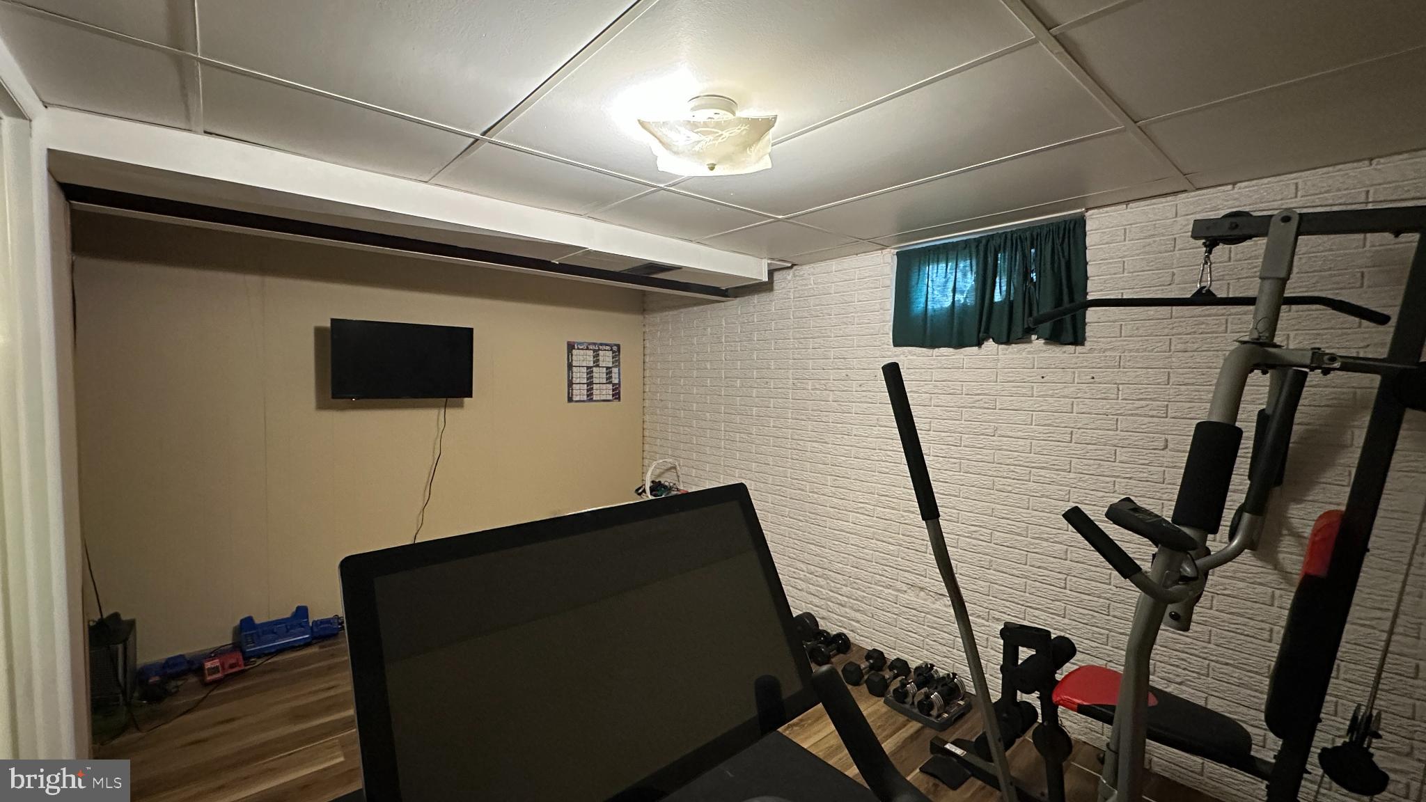 228 Embleton Road Owings Mills, MD 21117 - Photo 21 of 31 Home gym with modern workout equipment.